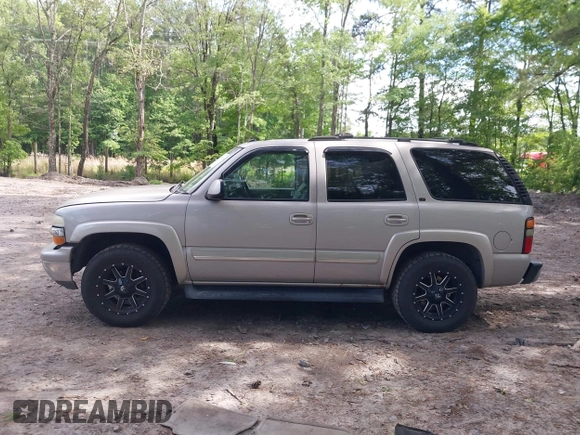 2005 Chevrolet Tahoe LS z VIN 1GNEK13T45J167997, wystawiony jako IAAI lot #42298160 z przebiegiem 142 981 mil mil oraz . Historia ofert i sprzedaży dostępna na DreamBid. Obrazek 14.