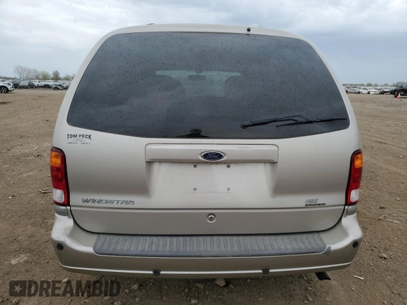2003 Ford Windstar SE with VIN 2FMDA52413BB59104, listed as a Copart auction lot 55134805 with 132,918 mi miles and Salvage title. Bid and sale history available at DreamBid. Image 6.