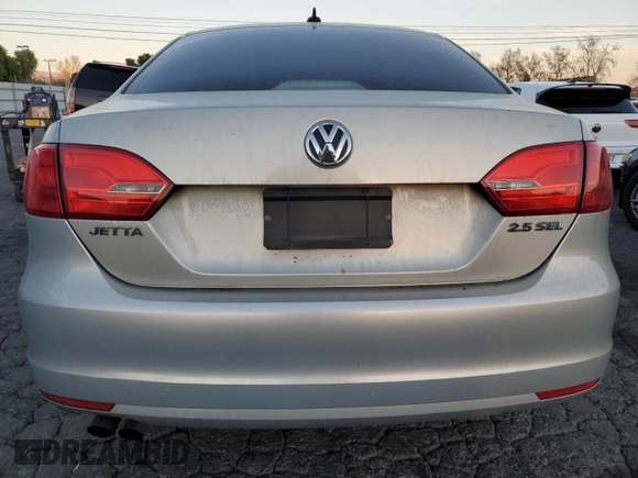 2012 Volkswagen Jetta Sedan SEL w/Sunroof with VIN 3VWLX7AJ7CM310458, listed as a Copart auction lot 87670525 with 142,944 mi miles and Salvage Title. Bid and sale history available at carsss.com. Image 6.