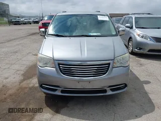 2014 Chrysler Town & Country Touring-L with VIN 2C4RC1CG2ER107917, listed as a IAAI auction lot 42180194 with 169,447 mi miles. Bid and sale history available at carsss.com. Image 12.
