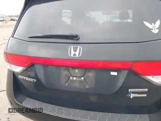 2014 Honda Odyssey Touring with VIN 5FNRL5H9XEB045695, listed as a IAAI auction lot 41545348 with 131,472 mi miles and . Bid and sale history available at carsss.com. Image 16.