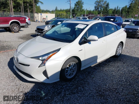 2017 Toyota Prius Two z VIN JTDKARFU1H3033538, wystawiony jako IAAI lot #42362770 z przebiegiem 74 671 mil mil oraz . Historia ofert i sprzedaży dostępna na DreamBid. Obrazek 17.