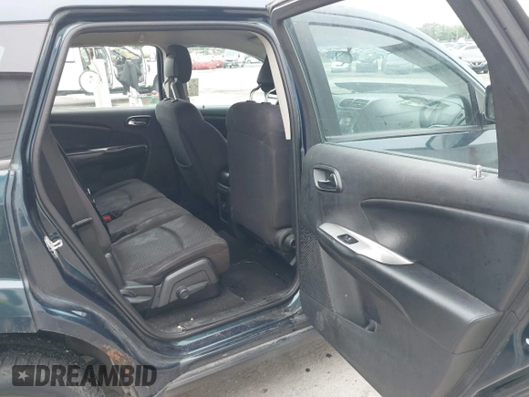 2013 Dodge Journey American Value with VIN 3C4PDCAB8DT602979, listed as a IAAI auction lot 42318493 with 179,210 mi miles and . Bid and sale history available at DreamBid. Image 8.