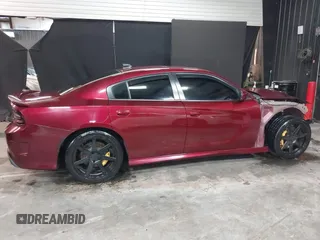 2019 Dodge Charger SRT Hellcat with VIN 2C3CDXL92KH693077, listed as a IAAI auction lot 39361432 with 57,522 mi miles and . Bid and sale history available at DreamBid. Image 14.