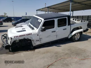 2020 Jeep Gladiator Rubicon with VIN 1C6JJTBG3LL138767, listed as a Copart auction lot 58490974 with 48,542 mi miles and Salvage Title. Bid and sale history available at DreamBid. Image 1.