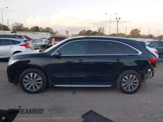 2014 Acura MDX Tech Pkg with VIN 5FRYD4H4XEB027753, listed as a IAAI auction lot 41131970 with 103,586 mi miles. Bid and sale history available at carsss.com. Image 15.