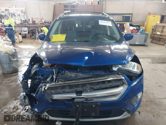 2018 Ford Escape SE z VIN 1FMCU9GD1JUB80500, wystawiony jako IAAI lot #41613294 z przebiegiem 112 187 mil mil oraz . Historia ofert i sprzedaży dostępna na DreamBid. Obrazek 12.