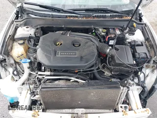 2015 Lincoln MKZ с VIN 3LN6L2G92FR605921, выставлен на аукционе IAAI как лот 42470145 с пробегом 174 569 миль миль и . История ставок и продаж доступна на DreamBid. Изображение 10.