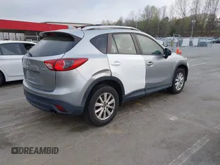 2013 Mazda CX-5 Touring with VIN JM3KE2CE0D0105115, listed as a IAAI auction lot 41899956 with 301,264 mi miles. Bid and sale history available at carsss.com. Image 4.