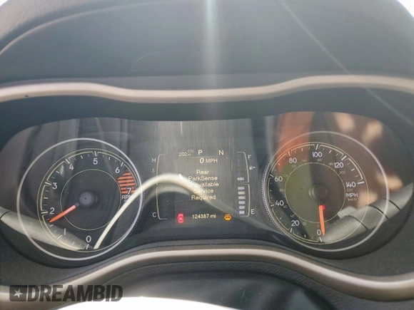2017 Jeep Cherokee Latitude with VIN 1C4PJLCB5HW540477, listed as a Copart auction lot 51736995 with 124,387 mi miles and Salvage Title. Bid and sale history available at DreamBid. Image 9.