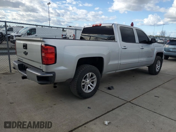2015 Chevrolet Silverado 1500 LT with VIN 3GCPCREC3FG533011, listed as a Copart auction lot 45026255 with 118,852 mi miles and Salvage Title. Bid and sale history available at DreamBid. Image 3.
