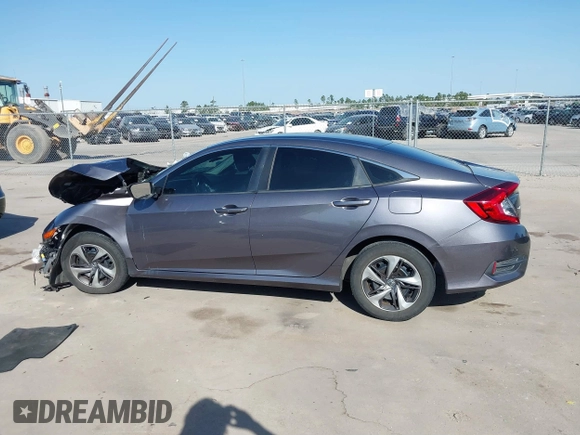 2020 Honda Civic LX z VIN 19XFC2F68LE023059, wystawiony jako IAAI lot #41856327 z przebiegiem 84 499 mil mil oraz . Historia ofert i sprzedaży dostępna na DreamBid. Obrazek 14.