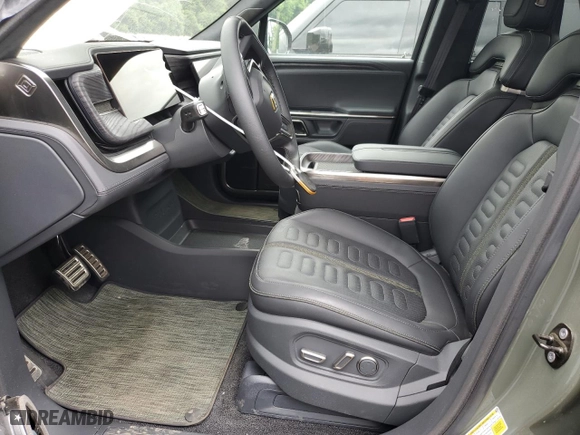 2022 Rivian R1S Launch Edition with VIN 7PDSGABL7NN001893, listed as a Copart auction lot 58809684 with 19,067 mi miles and Salvage Title. Bid and sale history available at carsss.com. Image 7.