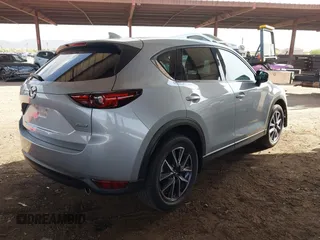 2017 Mazda CX-5 Grand Touring with VIN JM3KFADL3H0121772, listed as a IAAI auction lot 41935183 with 48,869 mi miles and . Bid and sale history available at carsss.com. Image 4.