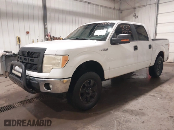 2012 Ford F-150 XL with VIN 1FTFW1EF1CFA87582, listed as a IAAI auction lot 42270927 with 199,779 mi miles and . Bid and sale history available at DreamBid. Image 2.