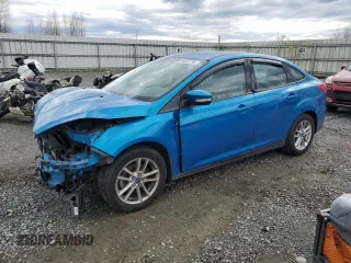 2016 Ford Focus SE with VIN 1FADP3F2XGL363525, listed as a Copart auction lot 50636195 with 129,756 mi miles and Salvage Title. Bid and sale history available at DreamBid. Image 1.