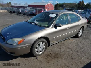 2005 Ford Taurus SEL with VIN 1FAFP56S05A158275, listed as a IAAI auction lot 41869232 with 136,477 mi miles. Bid and sale history available at carsss.com. Image 2.