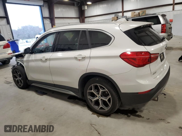 2018 BMW X1 sDrive28i with VIN WBXHU7C32J3H43903, listed as a Copart auction lot 45000375 with 76,158 mi miles and Salvage Title. Bid and sale history available at carsss.com. Image 2.