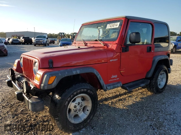 2003 Jeep Wrangler Sport with VIN 1J4FA49S43P332645, listed as a Copart auction lot 77424814 with 165,909 mi miles and Non Repairable. Bid and sale history available at carsss.com. Image 1.