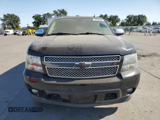 2009 Chevrolet Tahoe LTZ with VIN 1GNFK33089R139455, listed as a Copart auction lot 58953995 with 176,029 mi miles and Salvage title. Bid and sale history available at DreamBid. Image 5.