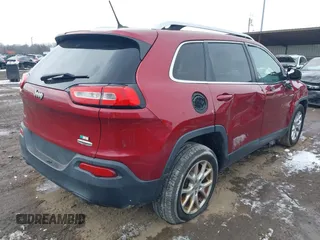 2014 Jeep Cherokee Latitude with VIN 1C4PJMCS2EW175306, listed as a IAAI auction lot 41620115 with 156,578 mi miles and . Bid and sale history available at carsss.com. Image 4.