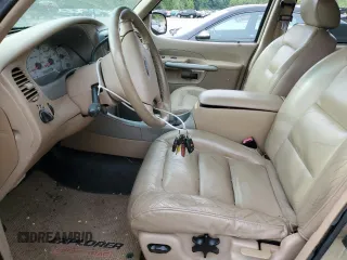 2001 Ford Explorer Sport Trac z VIN 1FMZU77E21UC54692, wystawiony jako Copart lot #57913505 z przebiegiem 204 574 mil mil oraz Czysty tytuł • Clean title. Historia ofert i sprzedaży dostępna na DreamBid. Obrazek 7.
