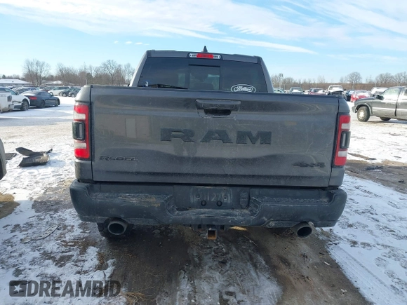 2022 Ram 1500 Rebel z VIN 1C6SRFLT9NN204868, wystawiony jako IAAI lot #41351273 z przebiegiem 67 120 mil mil oraz . Historia ofert i sprzedaży dostępna na DreamBid. Obrazek 16.