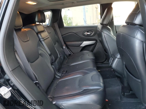 2018 Jeep Cherokee Overland with VIN 1C4PJMJX8JD562138, listed as a Copart auction lot 77249404 with 119,865 mi miles and Salvage Title. Bid and sale history available at carsss.com. Image 11.