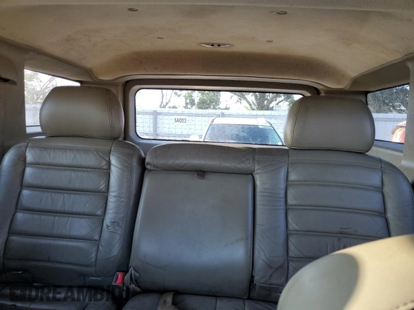 2003 Hummer H2 with VIN 5GRGN23U23H145779, listed as a Copart auction lot 72048564 with 268,329 mi miles and Clean Title. Bid and sale history available at carsss.com. Image 10.