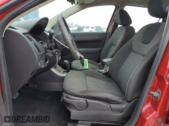 2009 Ford Focus SE with VIN 1FAHP35N79W134251, listed as a Copart auction lot 54049105 with 195,234 mi miles and Salvage Title. Bid and sale history available at carsss.com. Image 7.