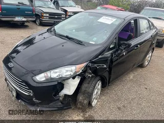 2016 Ford Fiesta SE z VIN 3FADP4BJ5GM151066, wystawiony jako IAAI lot #42200928 z przebiegiem 105 004 mil mil oraz . Historia ofert i sprzedaży dostępna na DreamBid. Obrazek 6.