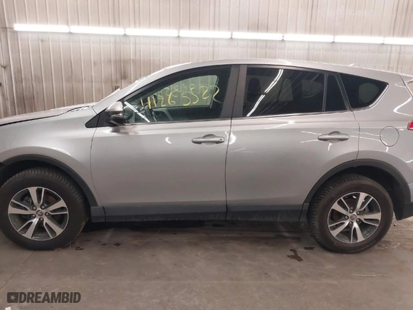 2018 Toyota RAV4 XLE with VIN 2T3RFREV4JW809416, listed as a IAAI auction lot 41263522 with 54,615 mi miles. Bid and sale history available at carsss.com. Image 15.