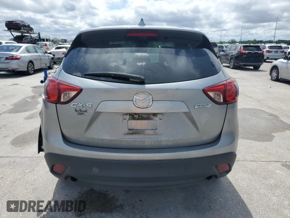 2014 Mazda CX-5 Sport with VIN JM3KE2BE1E0402185, listed as a Copart auction lot 52313675 with 140,398 mi miles and Salvage Title. Bid and sale history available at carsss.com. Image 6.