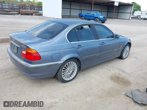 2001 BMW 3 Series 330i with VIN WBAAV53491JS94217, listed as a IAAI auction lot 42039234 with 128,977 mi miles. Bid and sale history available at carsss.com. Image 4.