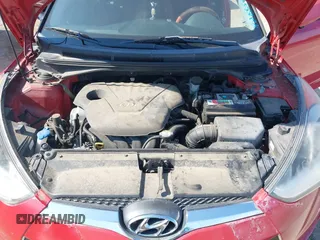 2012 Hyundai Veloster w/Black Int with VIN KMHTC6AD3CU032989, listed as a IAAI auction lot 42633748 with 137,727 mi miles and . Bid and sale history available at DreamBid. Image 10.