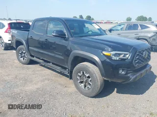 2022 Toyota Tacoma SR with VIN 3TMCZ5AN5NM505711, listed as a IAAI auction lot 42468414 with 39,840 mi miles and . Bid and sale history available at DreamBid. Image 1.