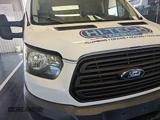 2016 Ford Transit Cargo with VIN 1FTYE1ZM0GKB06690, listed as a IAAI auction lot 42677893 with 295,974 mi miles and . Bid and sale history available at DreamBid. Image 19.