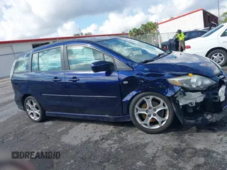 2009 Mazda 5 Sport with VIN JM1CR29L390355978, listed as a IAAI auction lot 41609117 with 118,588 mi miles and . Bid and sale history available at DreamBid. Image 13.