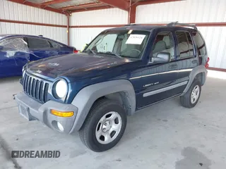 2002 Jeep Liberty Sport with VIN 1J4GL48K32W145174, listed as a IAAI auction lot 42028324 with 291,896 mi miles. Bid and sale history available at carsss.com. Image 2.