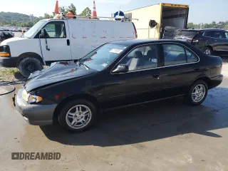 1999 Nissan Sentra XE with VIN 3N1AB41D5XL085943, listed as a Copart auction lot 63199065 with 167,555 mi miles and Salvage title. Bid and sale history available at DreamBid. Image 1.