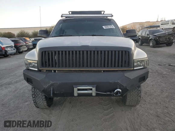 2000 Dodge 2500 z VIN 1B7KF2369YJ144753, wystawiony jako Copart lot #80801414 z przebiegiem 173 413 mil mil oraz Szkoda całkowita • Salvage title. Historia ofert i sprzedaży dostępna na DreamBid. Obrazek 5.