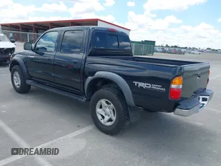 2003 Toyota Tacoma PreRunner z VIN 5TEGN92N03Z210194, wystawiony jako IAAI lot #42243037 z przebiegiem 241 047 mil mil oraz . Historia ofert i sprzedaży dostępna na DreamBid. Obrazek 3.