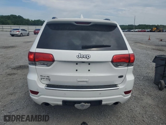 2017 Jeep Grand Cherokee Overland with VIN 1C4RJFCT7HC734125, listed as a Copart auction lot 54333215 with 101,229 mi miles and Salvage title. Bid and sale history available at DreamBid. Image 6.