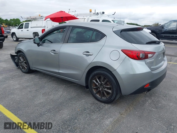 2014 Mazda 3 i Grand Touring with VIN JM1BM1M73E1216596, listed as a IAAI auction lot 41621165 with 127,235 mi miles and . Bid and sale history available at DreamBid. Image 3.