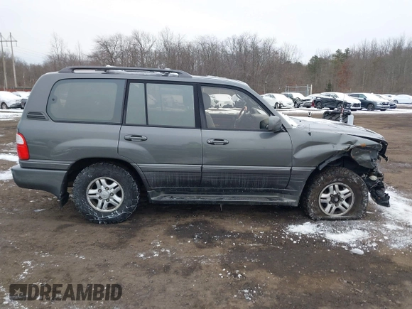 2000 Lexus LX 470 with VIN JT6HT00W9Y0096647, listed as a IAAI auction lot 41376347 with 231,916 mi miles and . Bid and sale history available at DreamBid. Image 13.