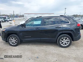 2014 Jeep Cherokee Latitude with VIN 1C4PJLCB6EW186576, listed as a IAAI auction lot 42099422 with 117,681 mi miles and . Bid and sale history available at DreamBid. Image 15.