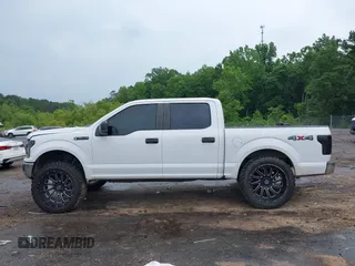 2019 Ford F-150 XL with VIN 1FTEW1EB2KKD98999, listed as a IAAI auction lot 42182839 with 162,098 mi miles and . Bid and sale history available at DreamBid. Image 14.