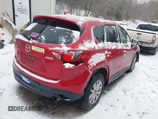 2016 Mazda CX-5 Touring with VIN JM3KE2CY3G0651194, listed as a IAAI auction lot 41657288 with 1 mi miles. Bid and sale history available at carsss.com. Image 4.