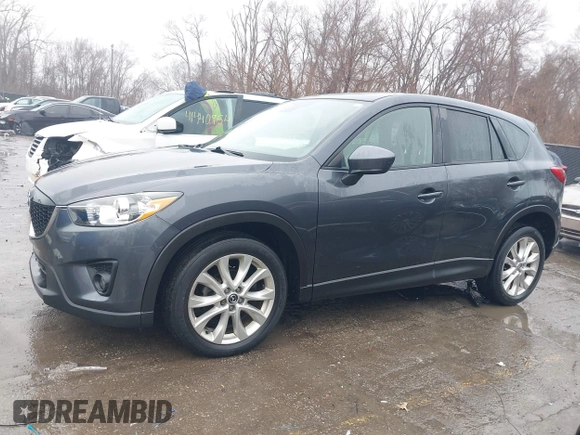 2014 Mazda CX-5 Grand Touring with VIN JM3KE4DY0E0392476, listed as a IAAI auction lot 41419144 with 89,245 mi miles and . Bid and sale history available at carsss.com. Image 14.