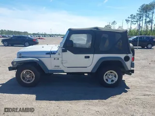 2006 Jeep Wrangler X with VIN 1J4FA39S86P743660, listed as a IAAI auction lot 41890339 with 198,099 mi miles. Bid and sale history available at carsss.com. Image 14.